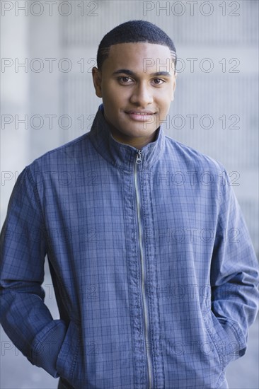 Young man looking at camera