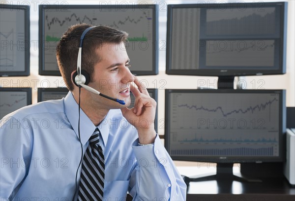 Male trader with headset.