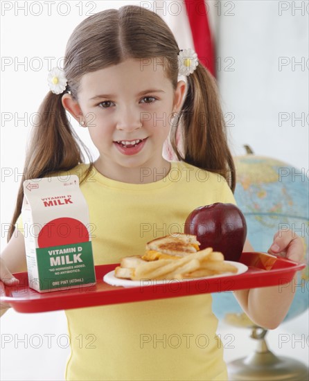 Child with lunch at school