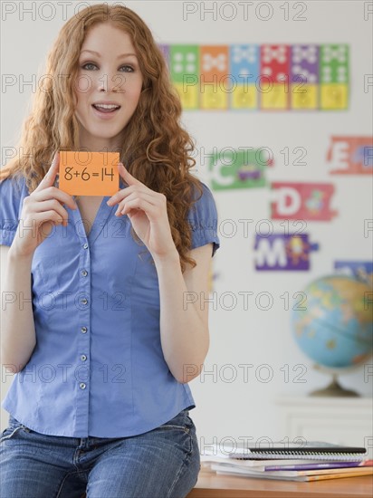 Woman holding flashcard