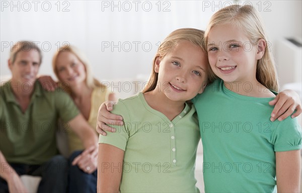 Happy sisters at home.