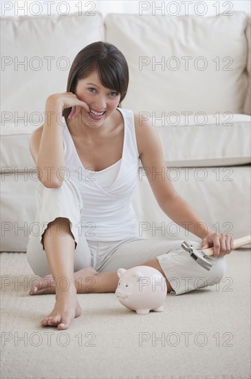 Woman with piggy bank.