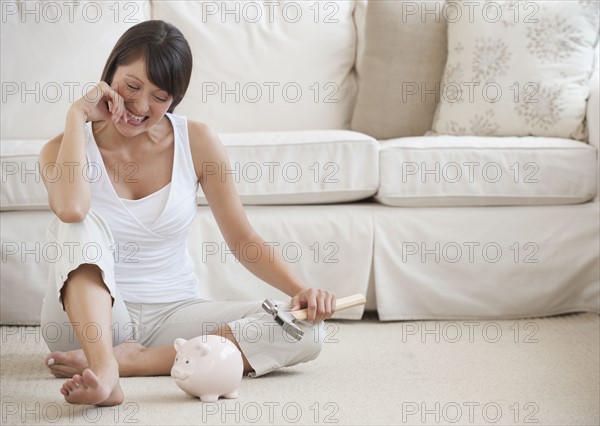 Woman with piggy bank.