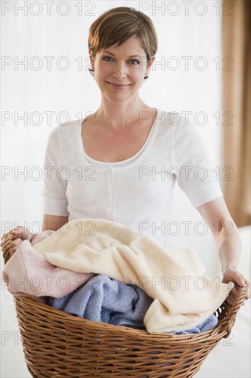 Woman doing laundry.