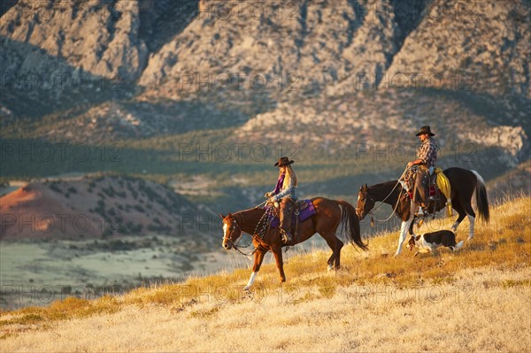 Horseback riders.