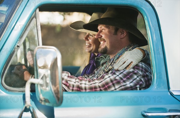 Couple in truck.