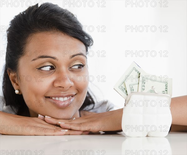 Woman looking at money