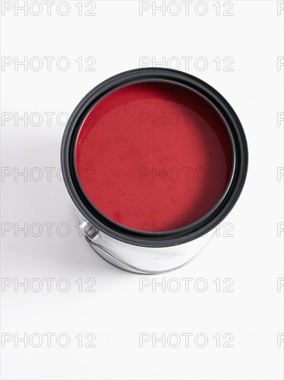 Can of red paint