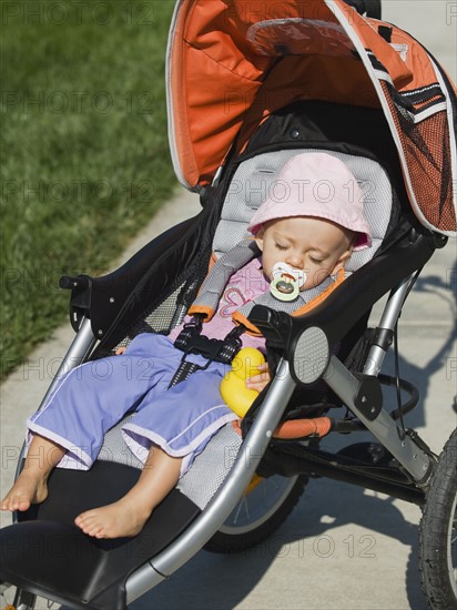 Baby sleeping in stroller