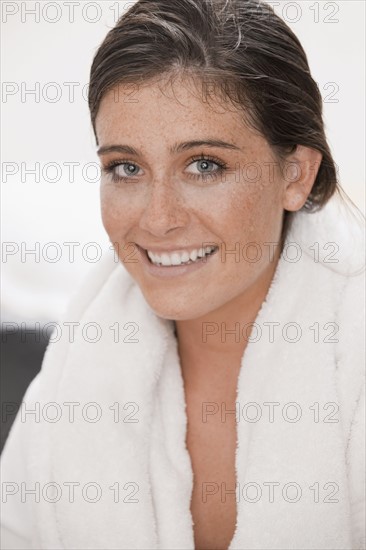 Young woman wearing robe