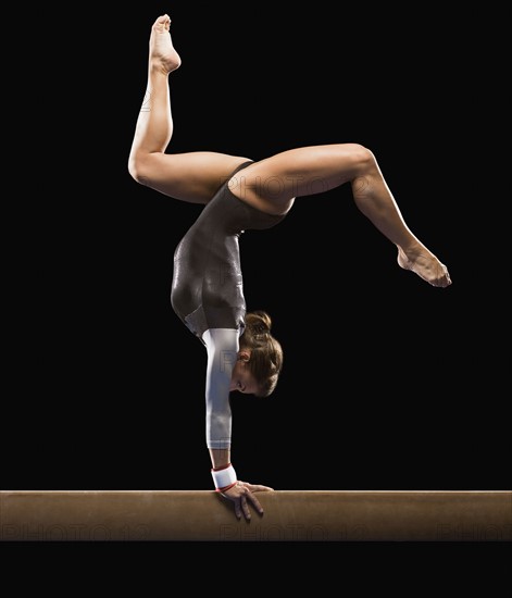 Gymnast on balance beam