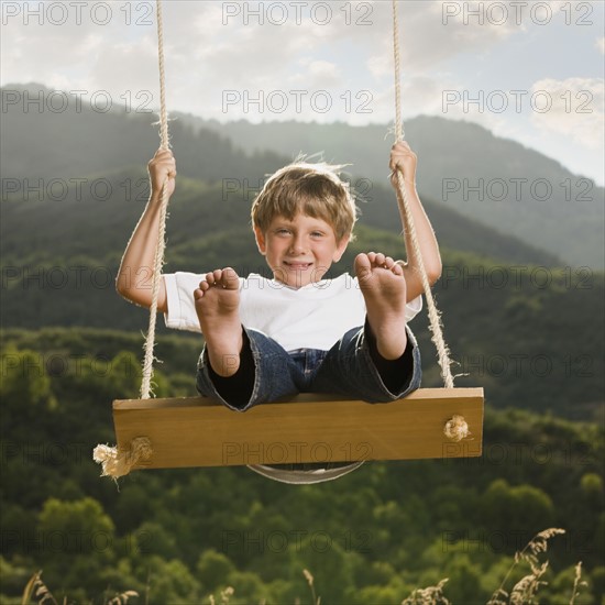 Boy swinging