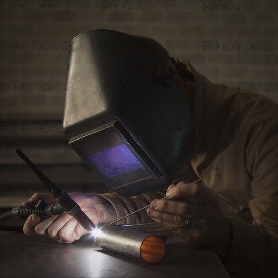 Steel worker in metal shop