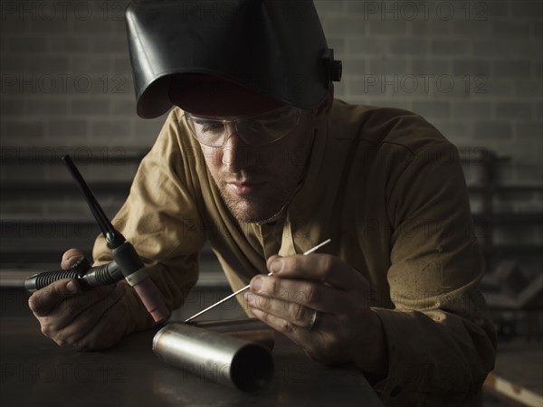 Steel worker in metal shop