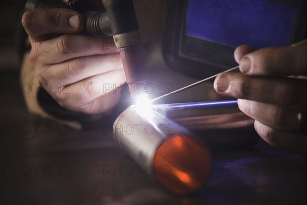 Steel worker in metal shop