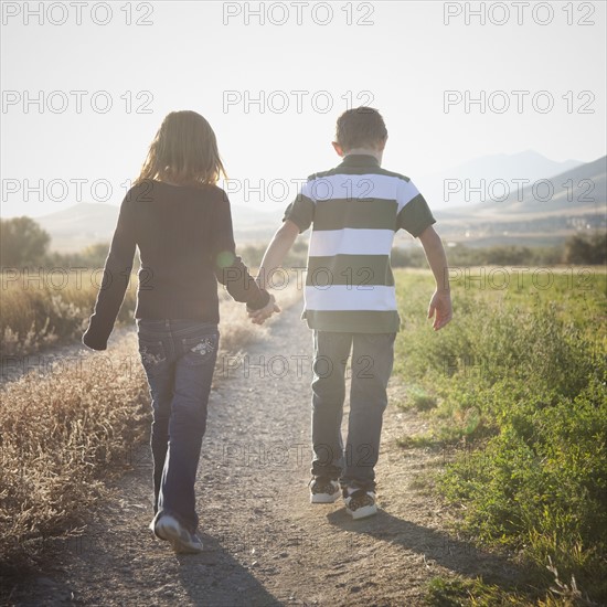 Young children walking on path