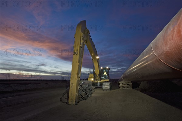 Heavy equipment beside pipeline