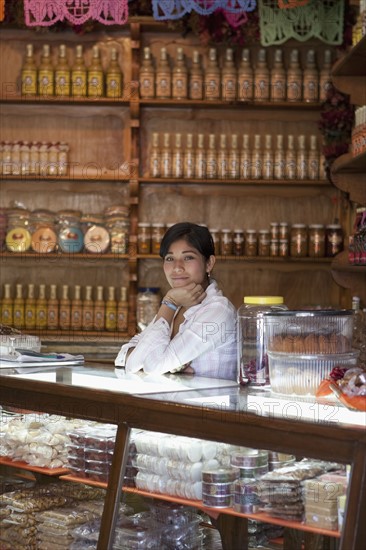 Woman at candy counter