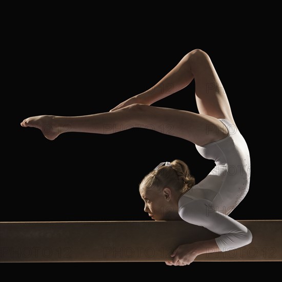 Gymnast on balance beam