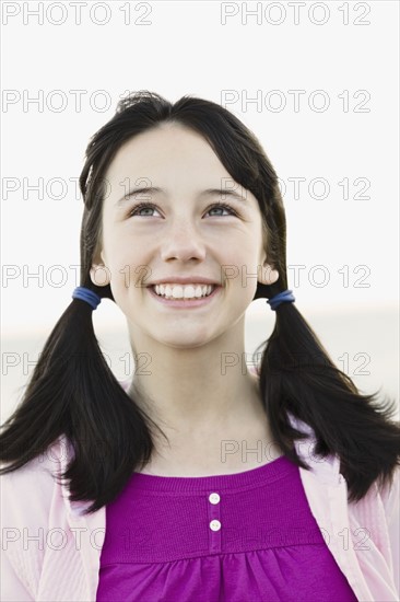 Young girl with ponytails