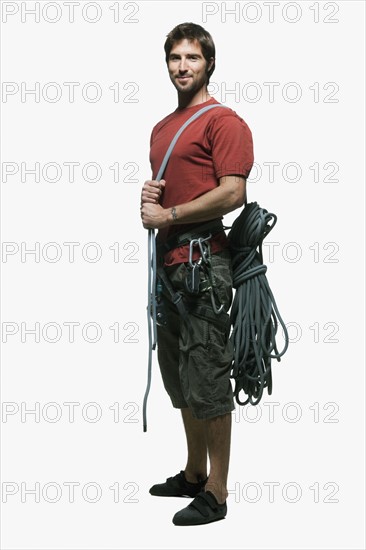 Portrait of man with climbing gear