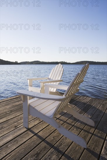 Adirondack chairs on dock