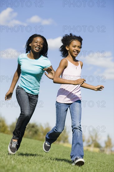 Two girls running