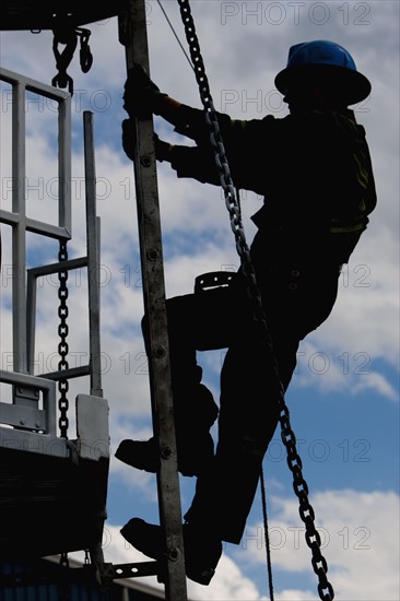 Worker climbing