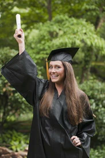 Graduate with diploma