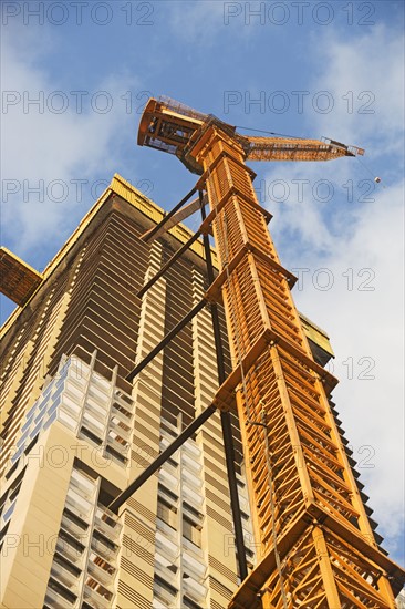 Crane and high-rise building