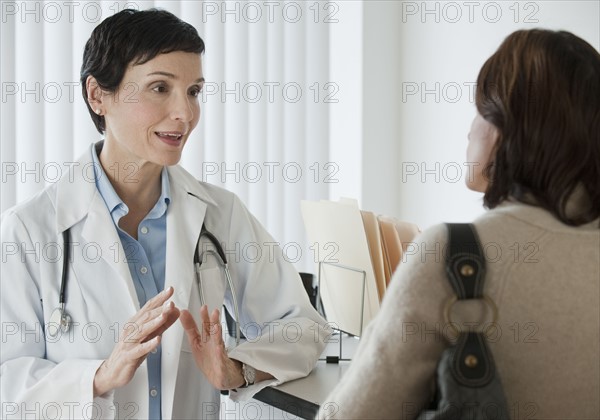 Doctor talking to patient.