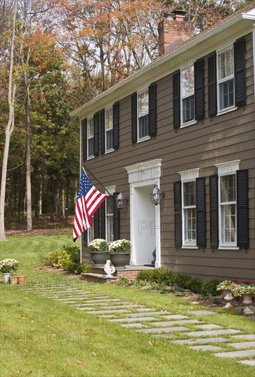 American flag on house.