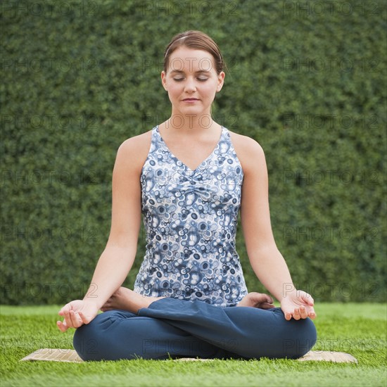 Woman doing yoga.