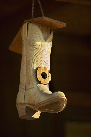 Cowboy boot bird house.