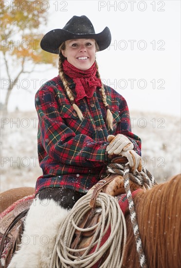 Cowgirl on horse.