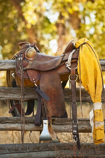 Saddle on fence.