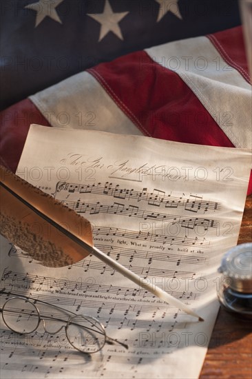 Sheet music on American flag.
