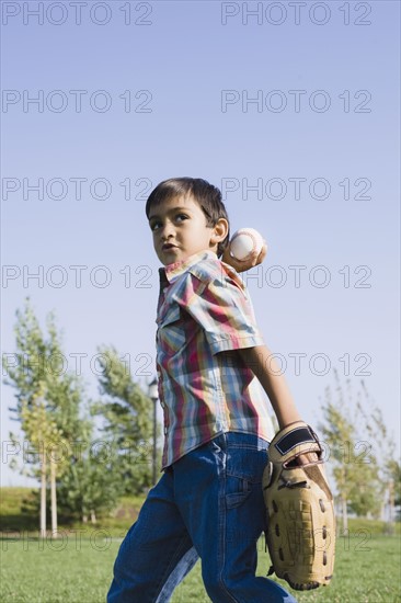 Boy playing baseball