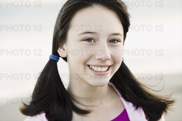 Young girl with pony tails