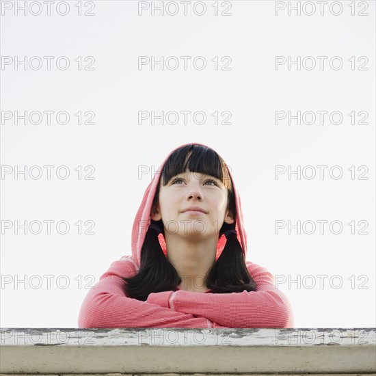 Girl leaning on railing