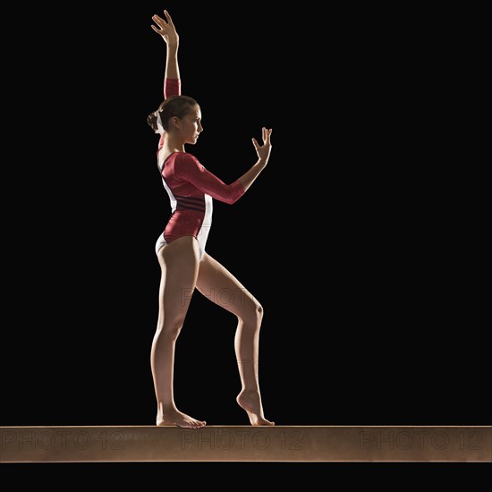 Gymnast on balance beam