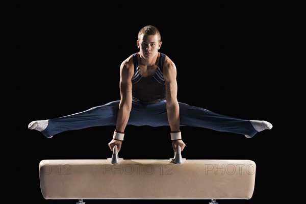 Gymnast on pommel horse