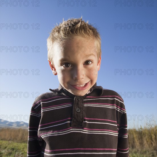 Young boy with goofy expression