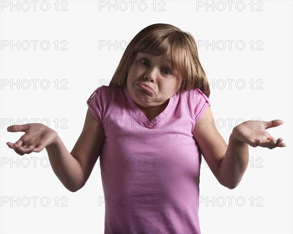 Portrait of confused young girl