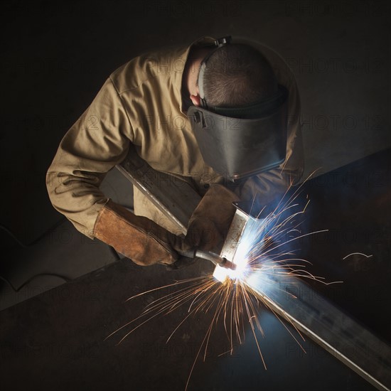 Steel worker in metal shop