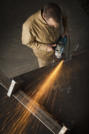 Steel worker in metal shop