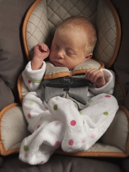 Baby sleeping in car seat