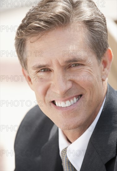 Smiling businessman.