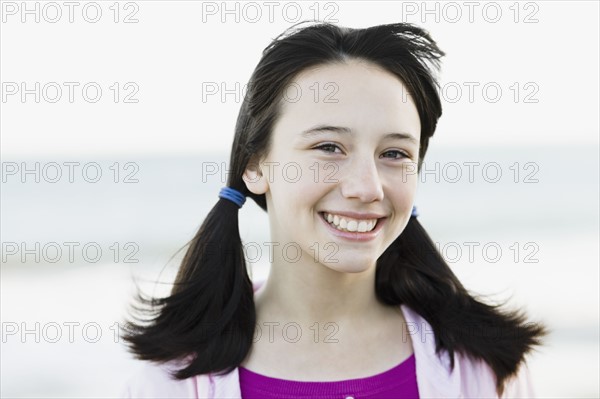 Young girl with pony tails