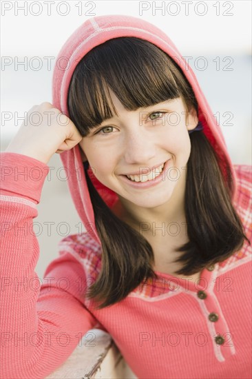 Girl leaning on railing